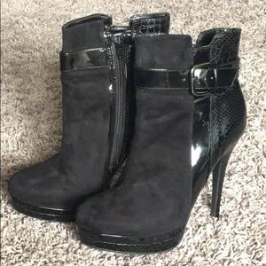 Black snakeskin heeled booties